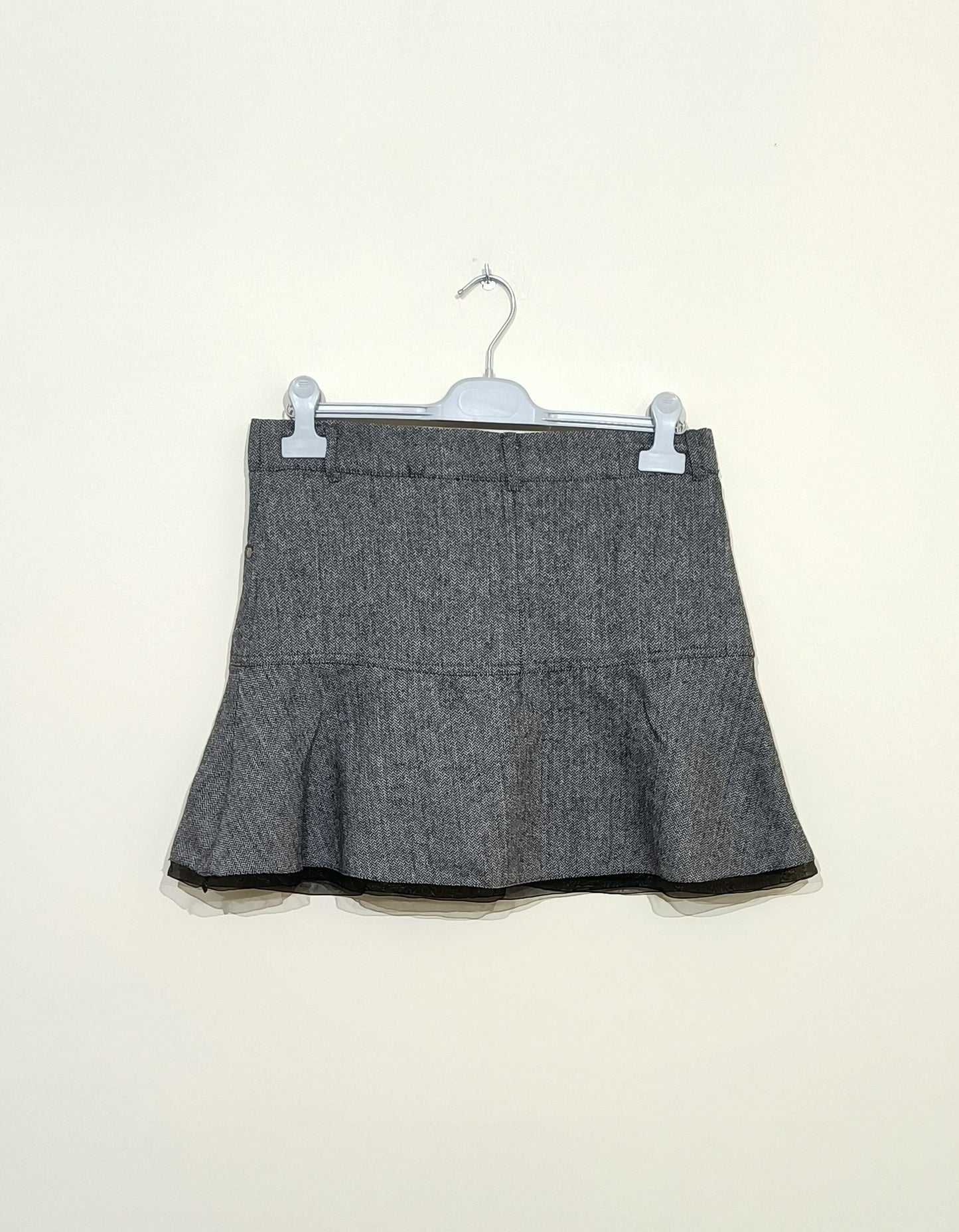 Jupe courte Mim à motifs géométriques noirs et blancs avec volant Taille 40