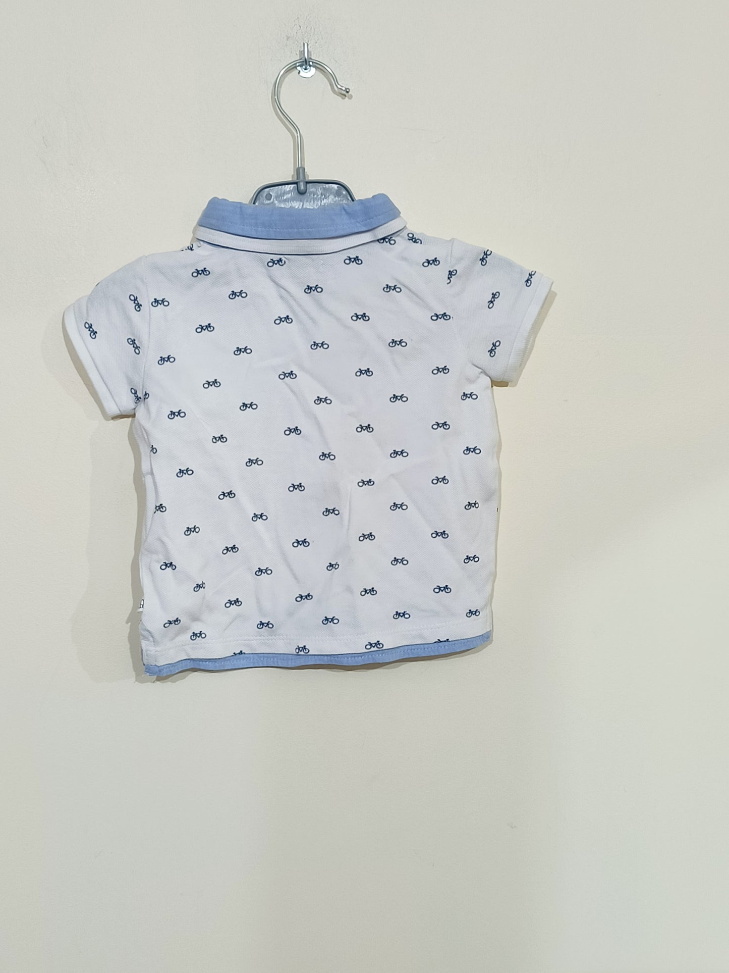 Polo Kiabi blanc avec motifs vélos Taille 9 Mois