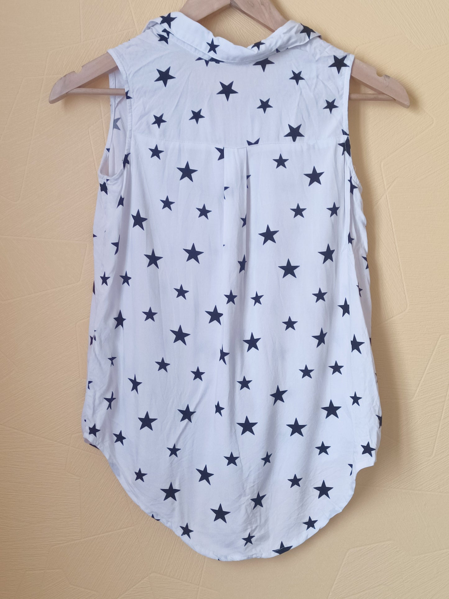 Chemise sans manche H&M blanche à étoiles Taille 10-11 Ans