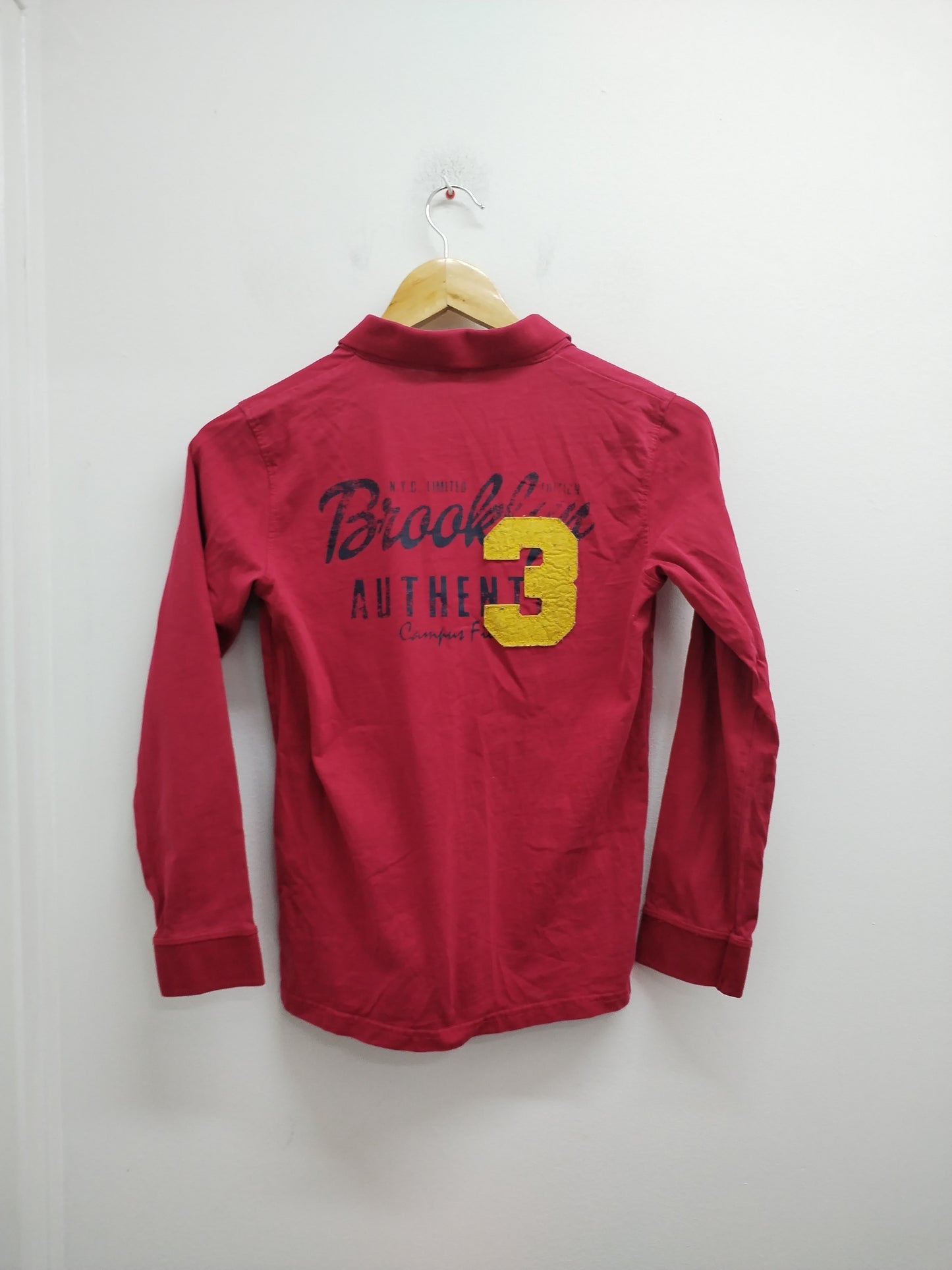 Polo manches longues Tape à l'Œil rouge foncé Taille 12 Ans