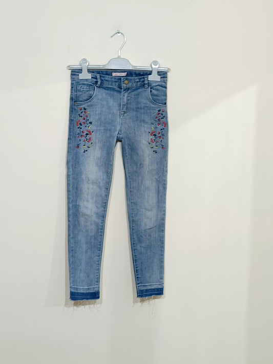 Jeans Gémo bleu avec broderie fleurie Taille 10 Ans