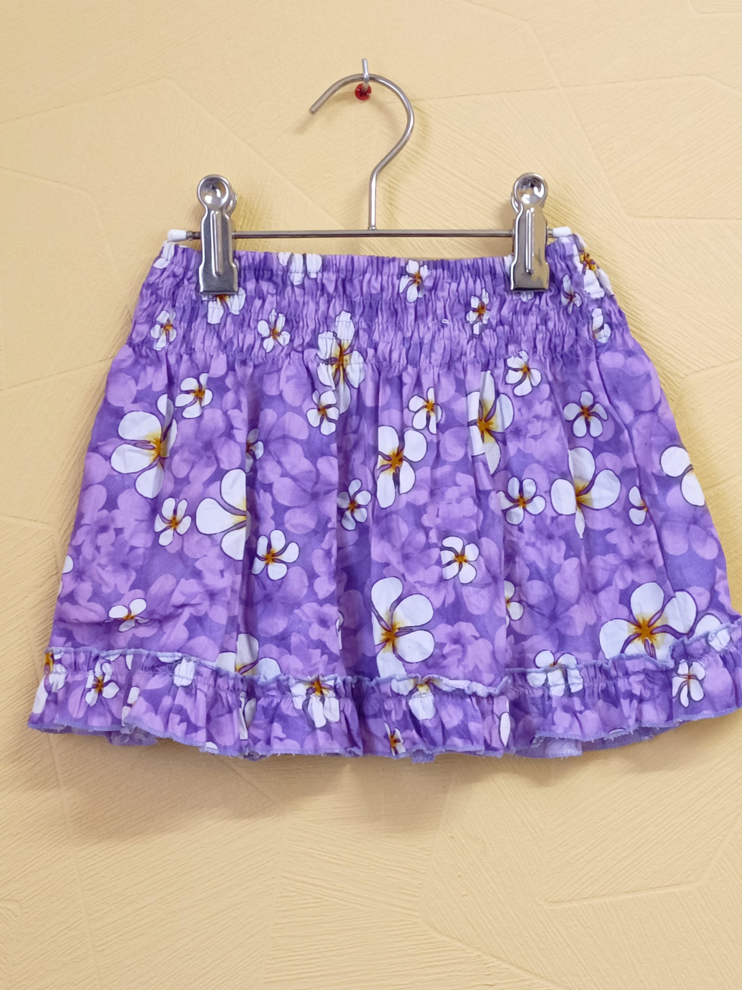 Jupe violette avec fleurs Taille 3 Ans