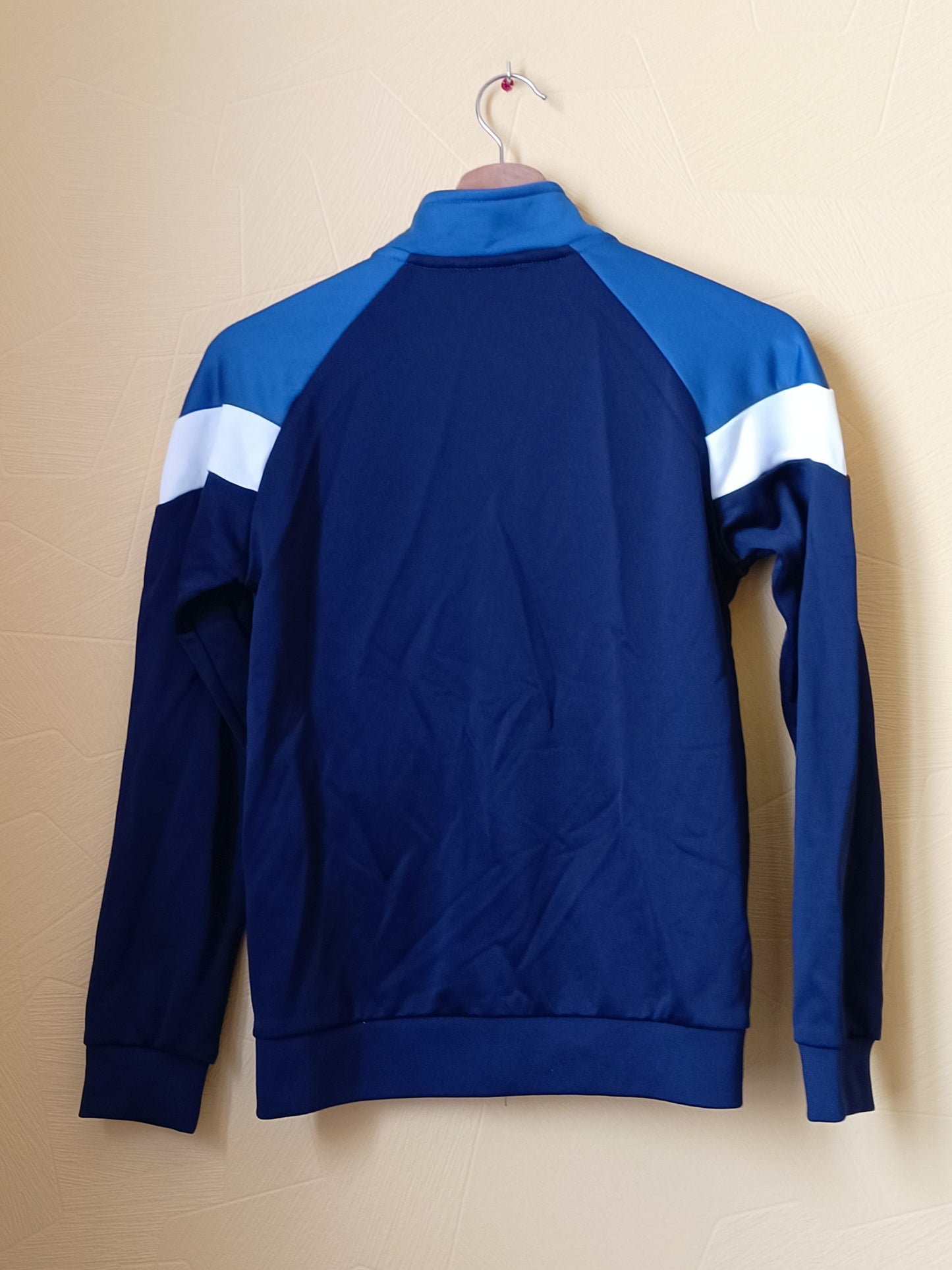 Veste de jogging Puma bleue et blanche Taille 11/12 ans