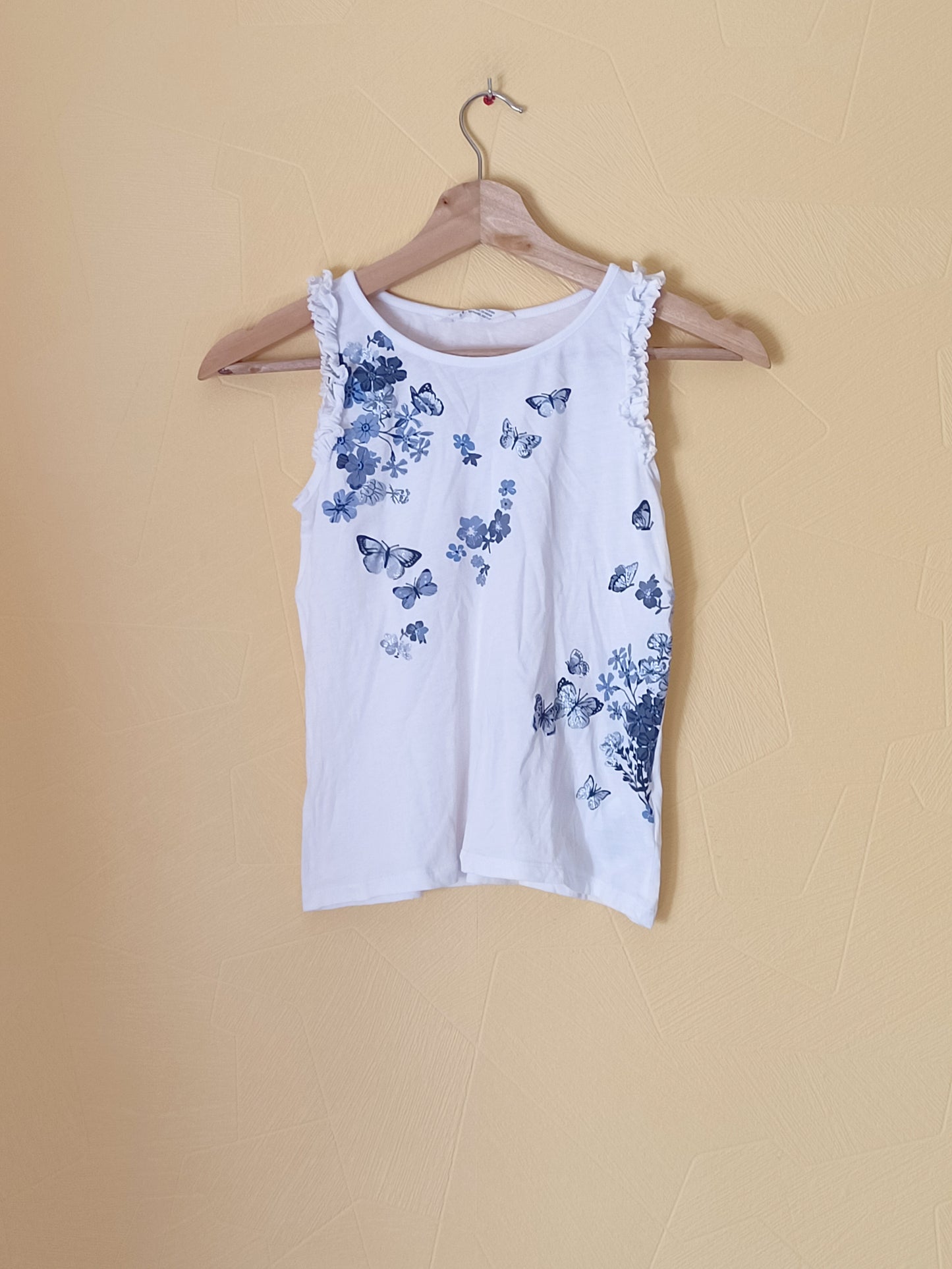 Débardeur H&M blanc à motifs fleurs et papillons Taille 8/10 Ans