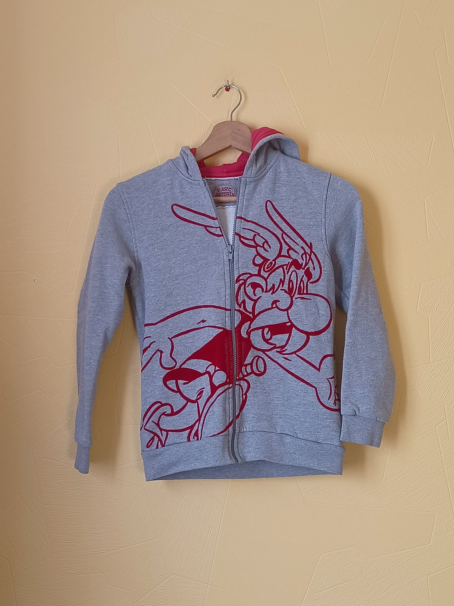 Sweat zippé à capuche Parc Astérix gris et rouge Taille 8/10 Ans