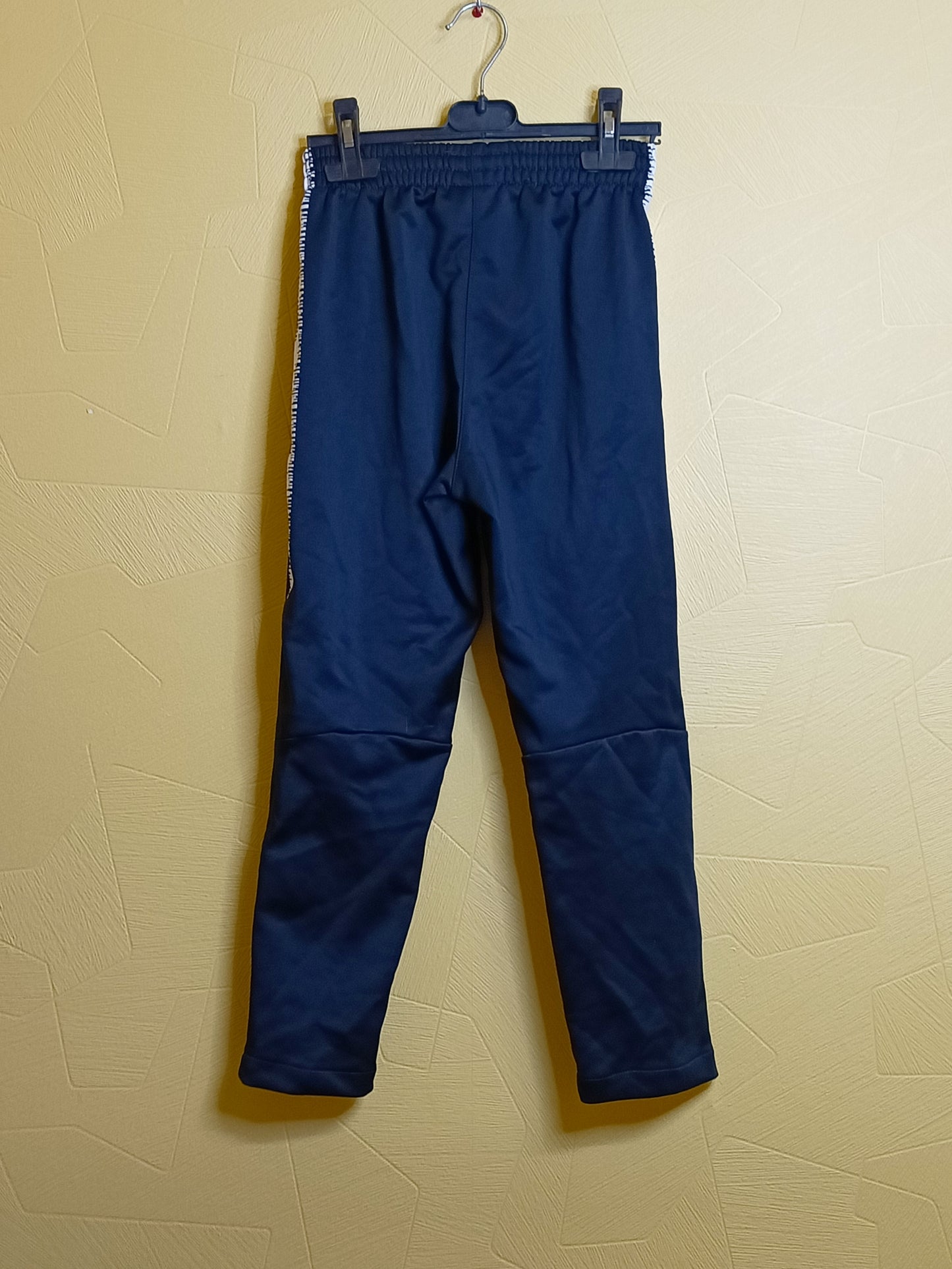 Jogging Sport bleu marine avec liseré blanc Taille 12 Ans