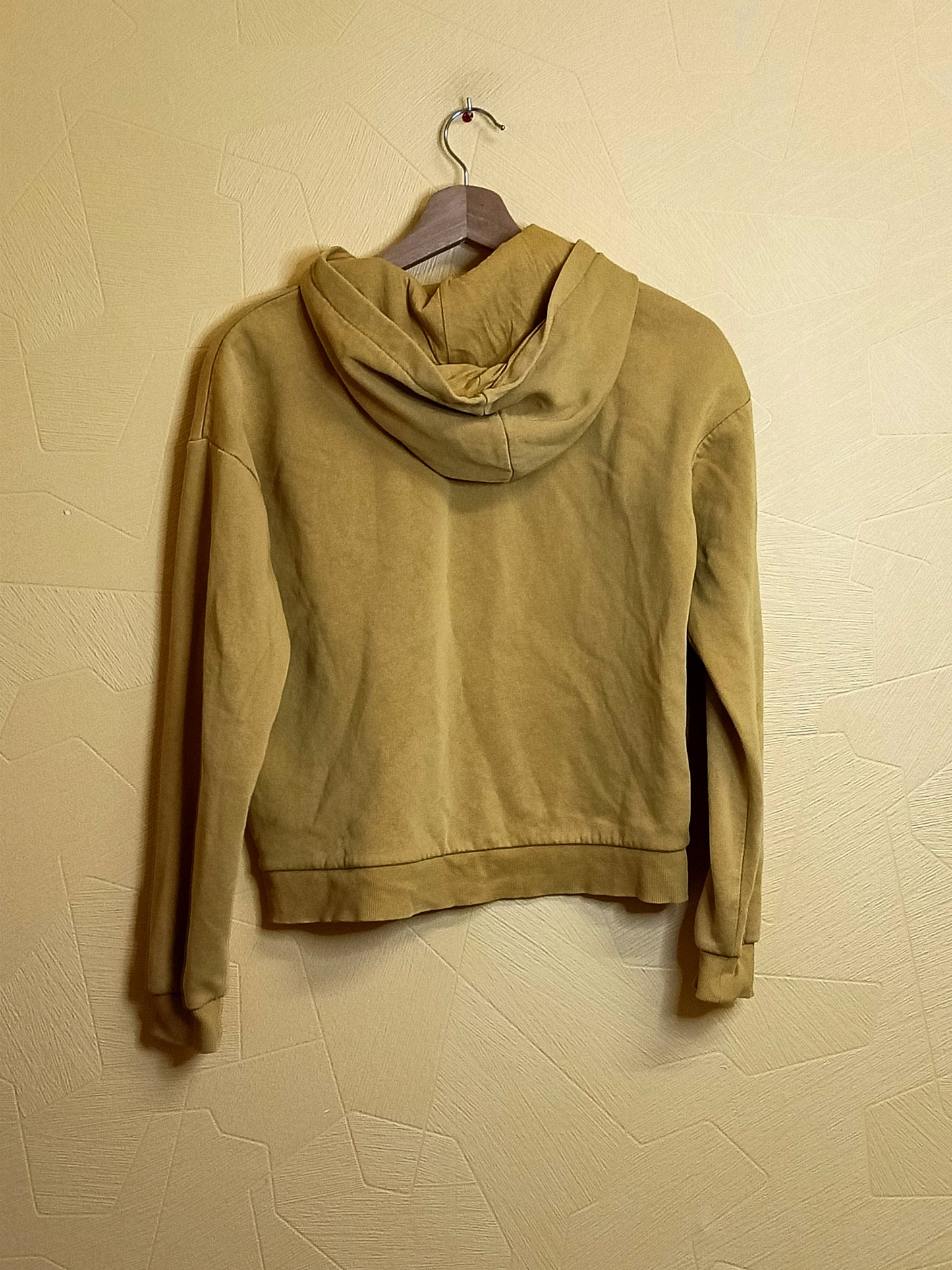 Sweat à capuche Kiabi moutarde avec impression Taille 12 Ans