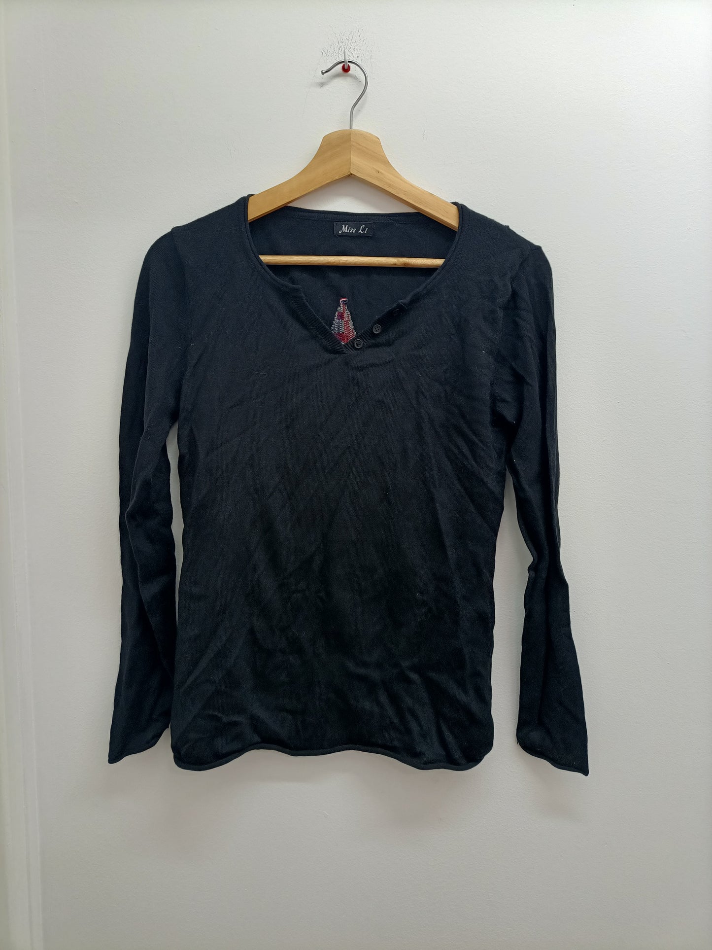 Pull fin Miss Li noir avec étoile dans le dos Taille M