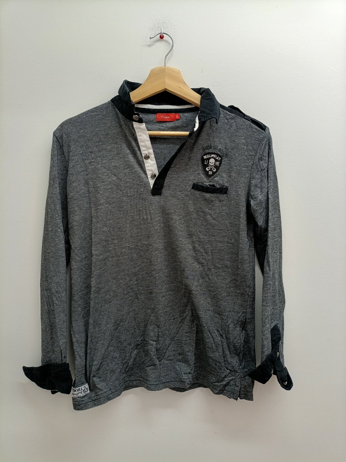 Polo manches longues Tissaia rayé noir et blanc Taille 14 Ans