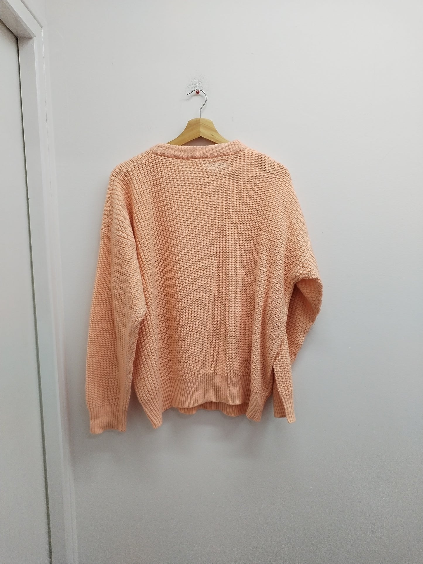 Pull en mailles saumon Taille 50