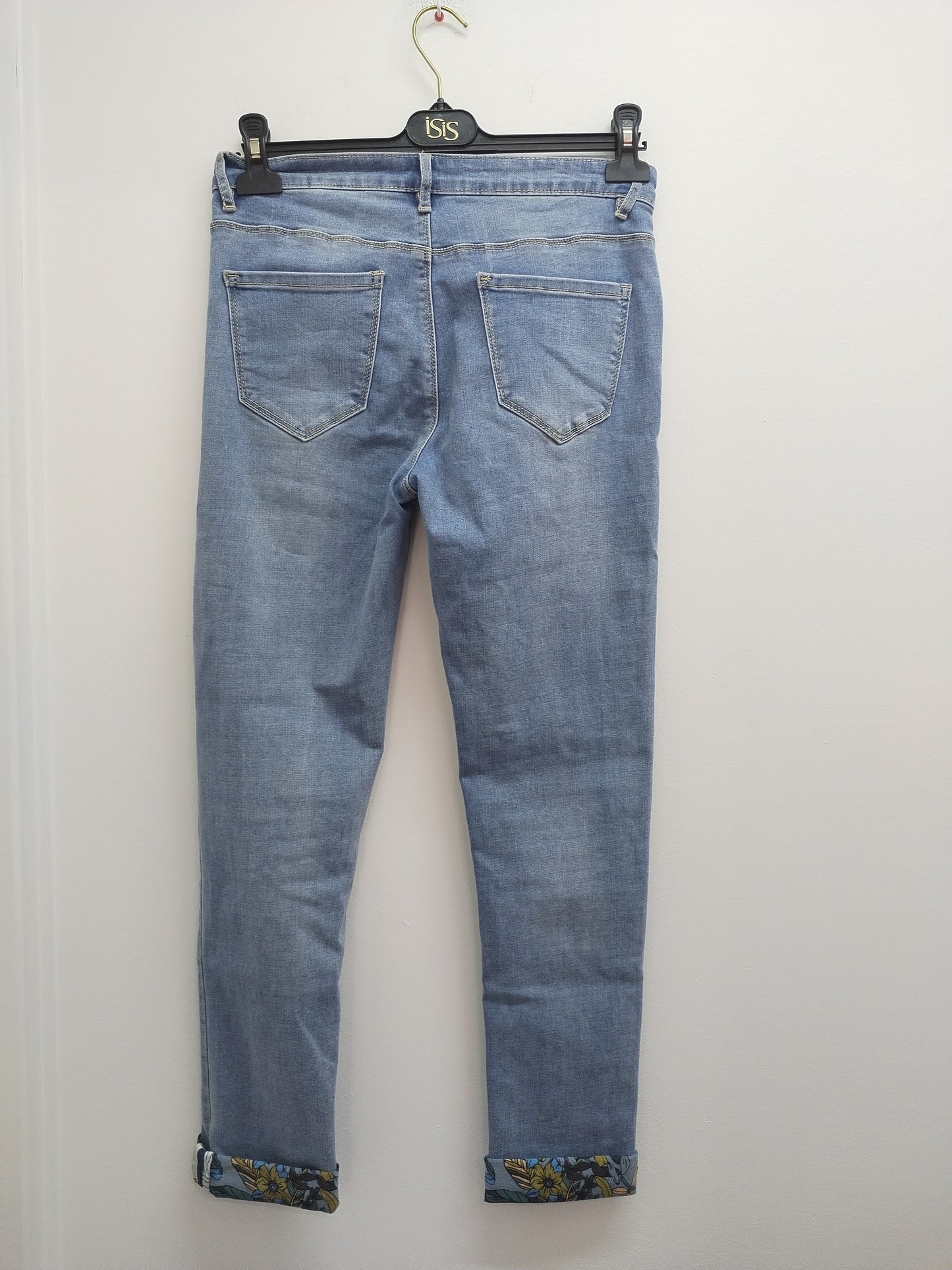 Jeans Cache-Cache bleu clair avec ourlets fleuris Taille 38