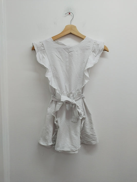 Robe sans manche Kiabi blanche avec volants Taille 8 Ans