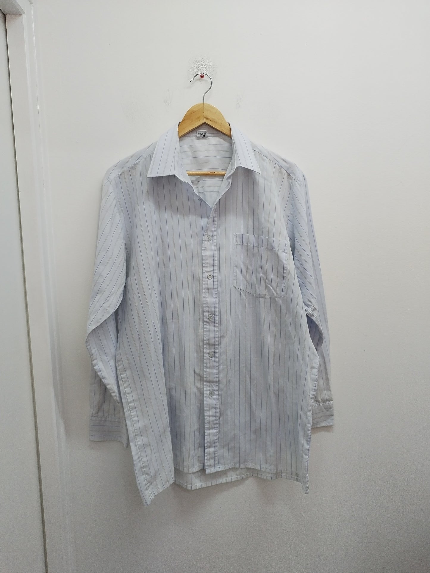 Chemise manches longues bleue claire rayée Taille M