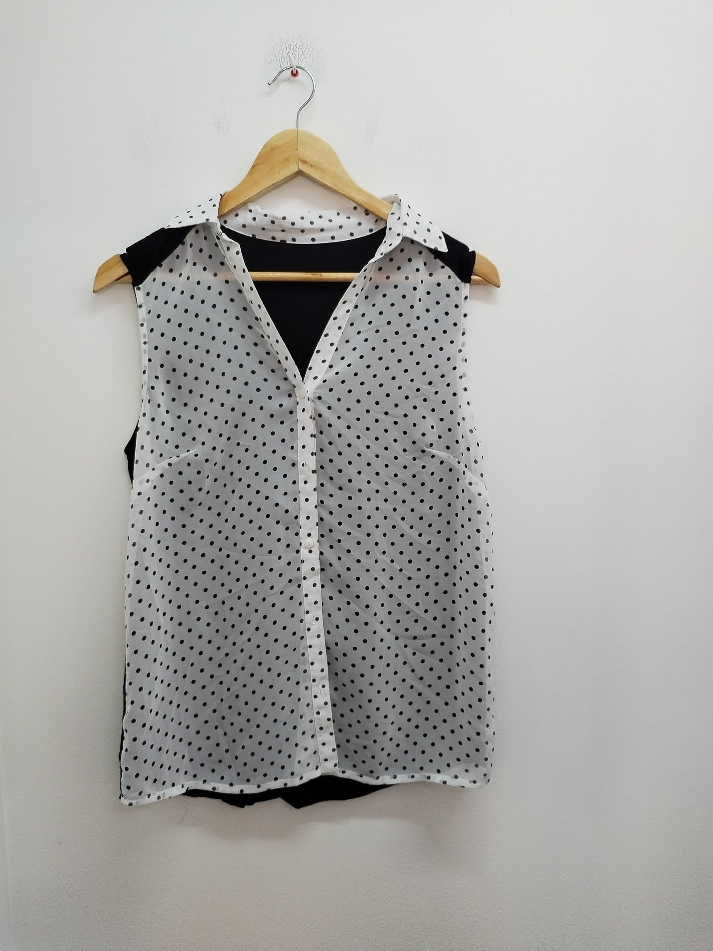 Chemise sans manches noire et blanche à pois Taille M