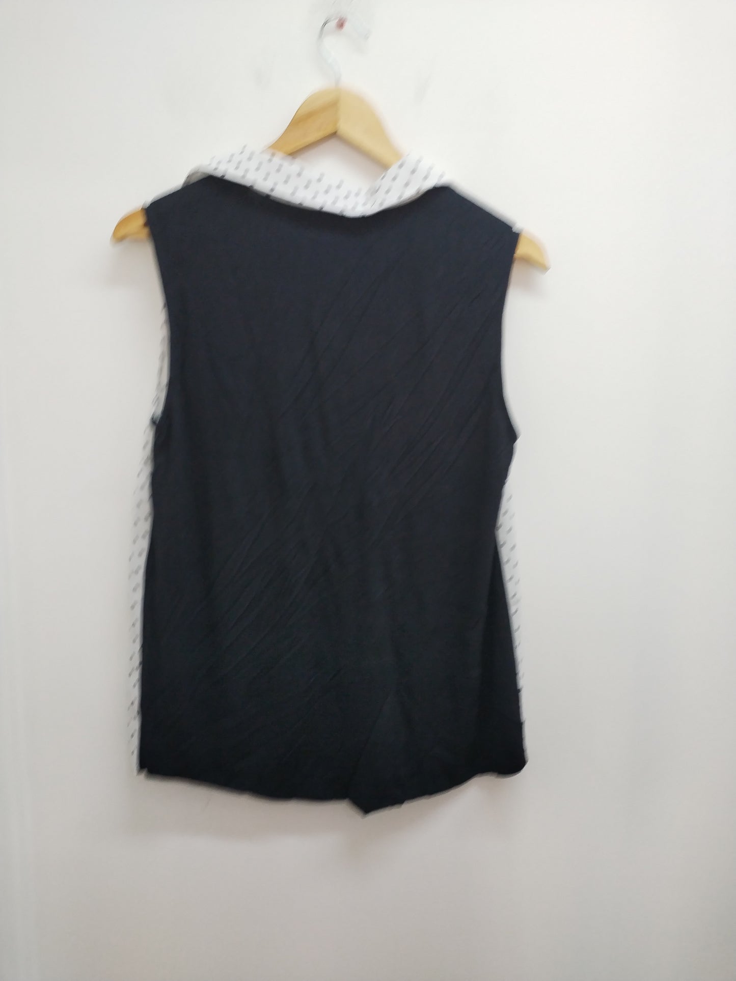 Chemise sans manches noire et blanche à pois Taille M
