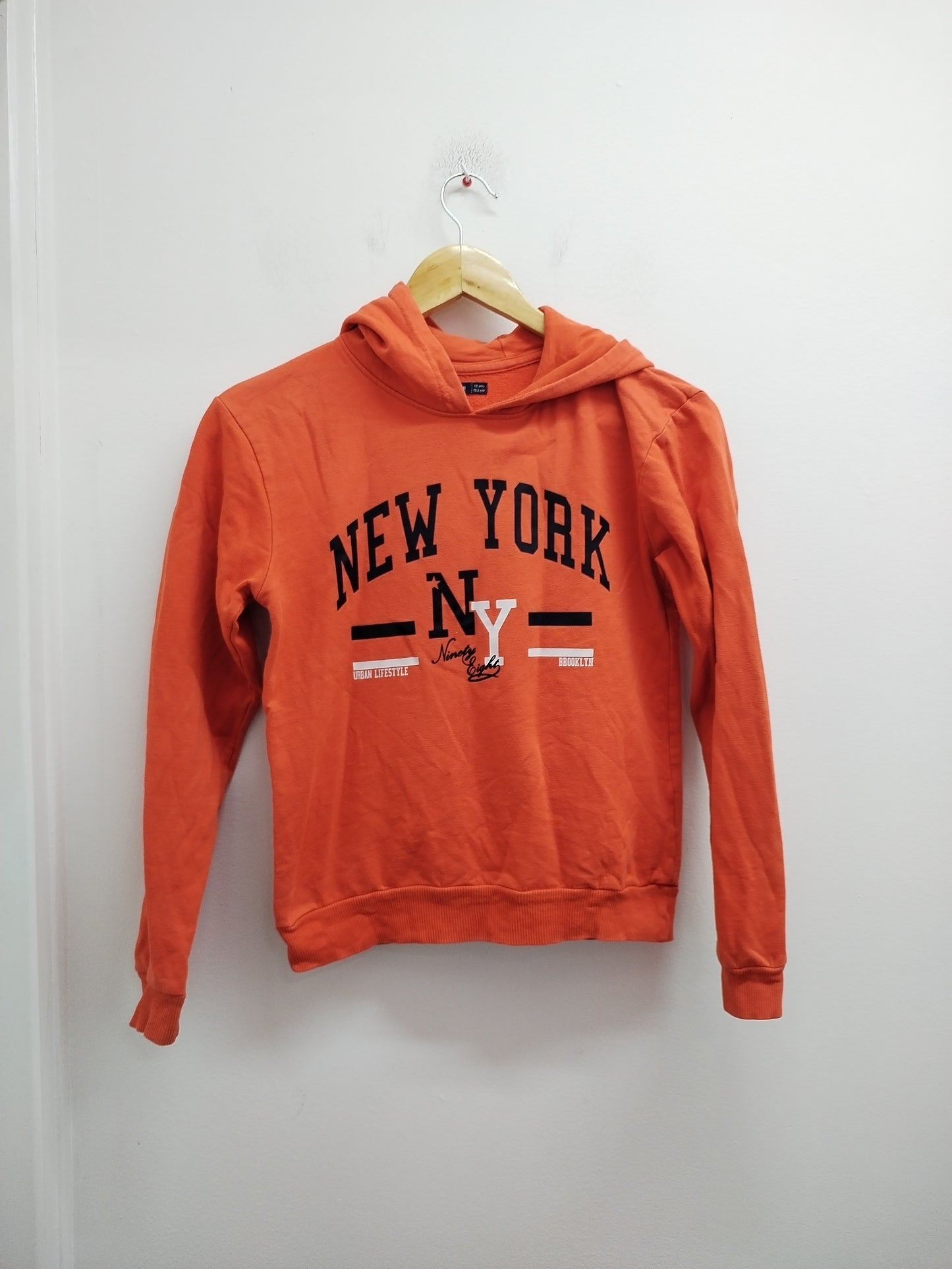 Sweat à capuche NPO Junior orange avec impression Taille 12 Ans