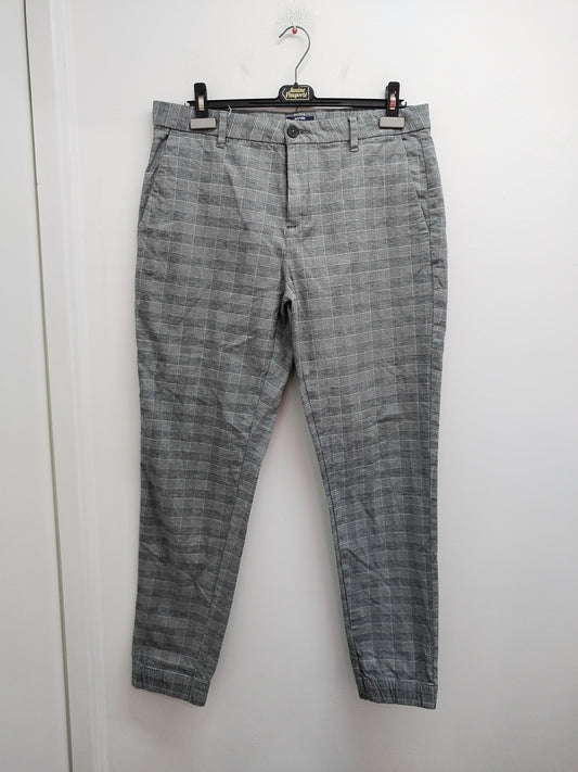 Pantalon Kiabi gris motifs "pied de poule" Taille 44