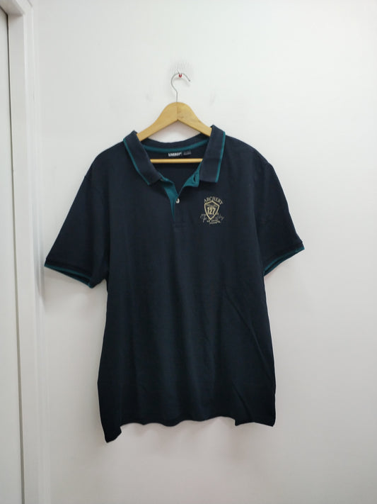 Polo Livergy noir avec liseré vert Taille XL