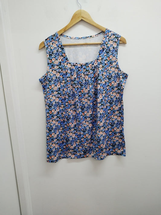 Tunique sans manches bleue fleurie Taille 46