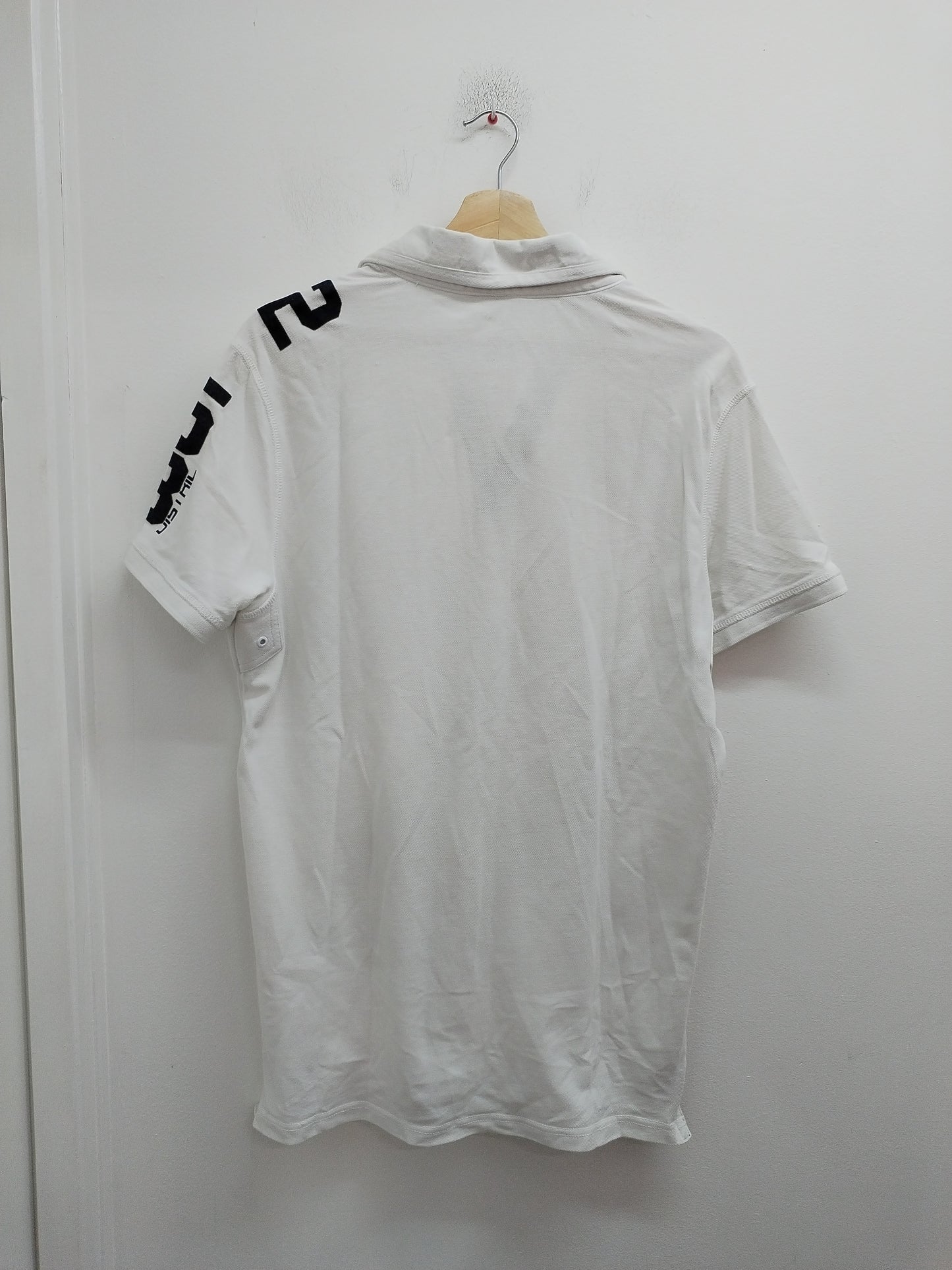 Polo Celio blanc avec broderie Taille L
