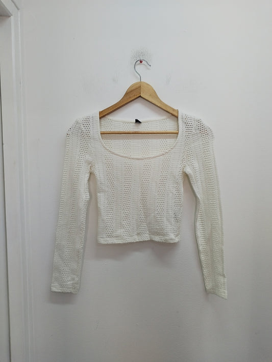 Pull court mailles ajourées Kiabi blanc cassé Taille 12 Ans
