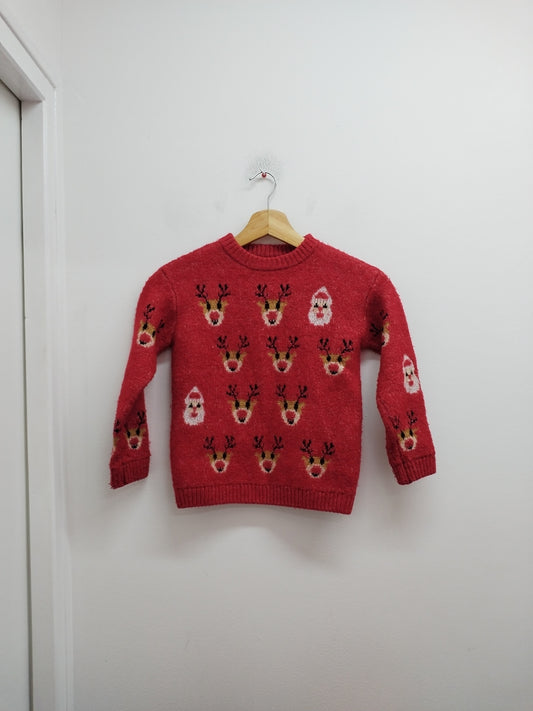 Pull de Noël Kiabi rouge à motifs Taille 5 Ans