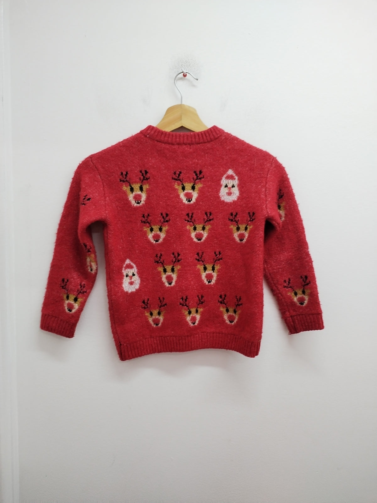 Pull de Noël Kiabi rouge à motifs Taille 5 Ans